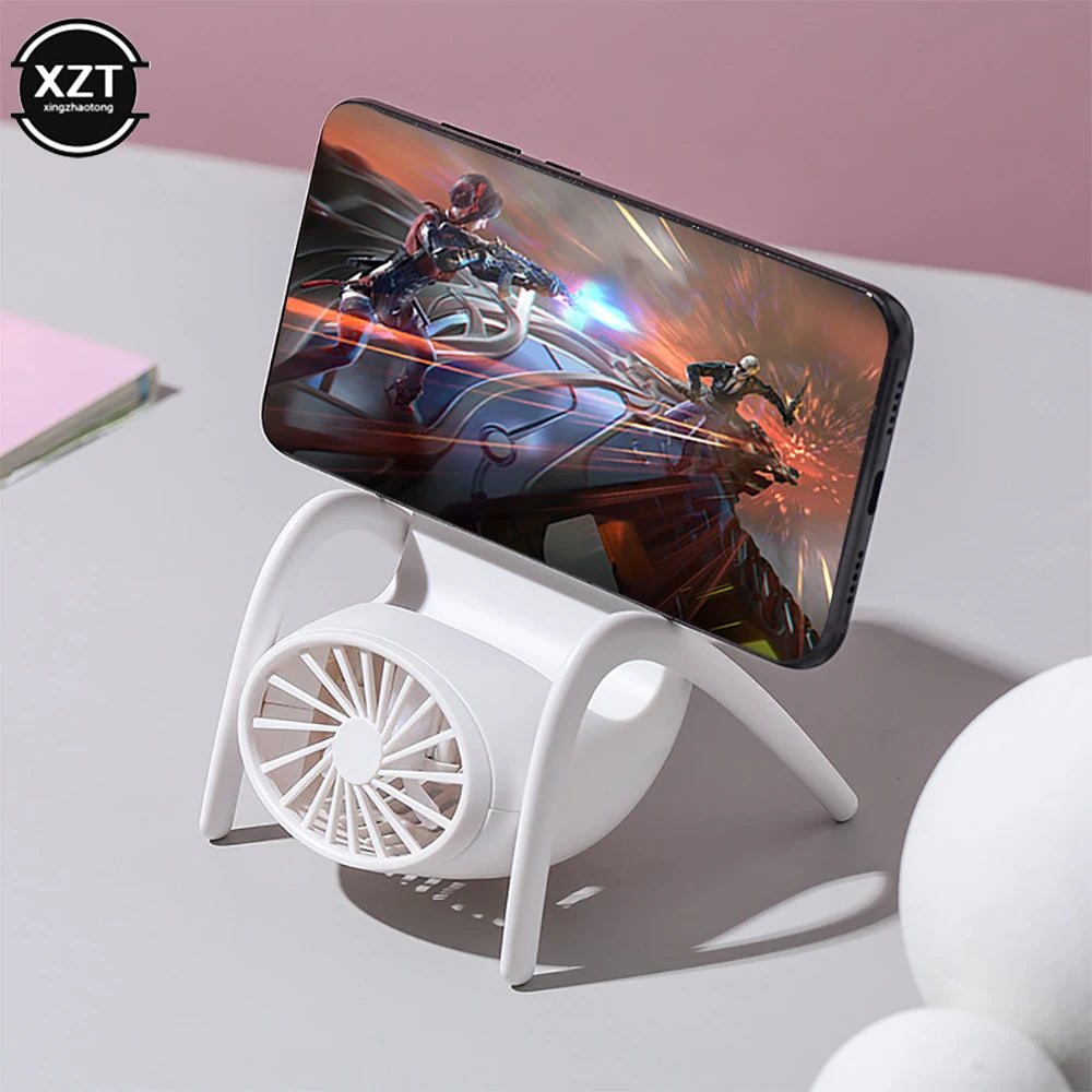 2022 Nouveau support de téléphone Small ventilateur avec lampe respiratoire Mini Mini Chaise de charge USB Ventilateur portable avec porte-téléphonie